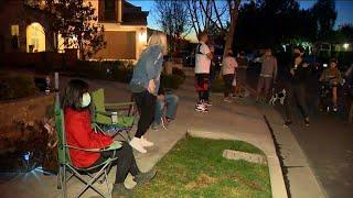 Neighbors of Harassed Asian Family Take Turns Standing Guard