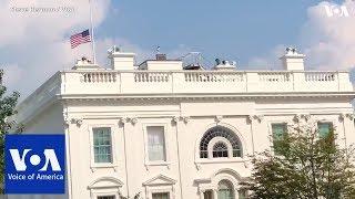 The American flag files at half-staff at the White House for Sen. John McCain