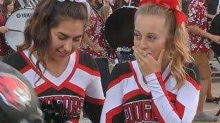 Football players' kind gesture to cheerleader goes viral