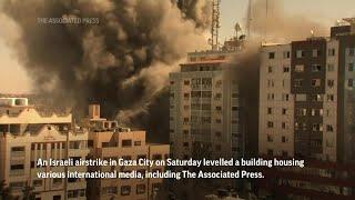 Israel strike in Gaza destroys building with AP, other media