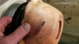 Woodturning an iron wood live edge bowl.