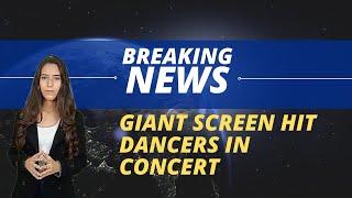 CCM - International - Giant screen hits dancers in concert