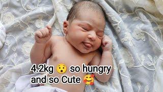 Cutest Big Newborn baby is just born and ready to Eat Burger just after normal delivery birth