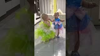 Cute Twin Baby Boys Wearing Plastic Skirts #baby #funny #cute #cutebaby #babyboy #twins #babycute