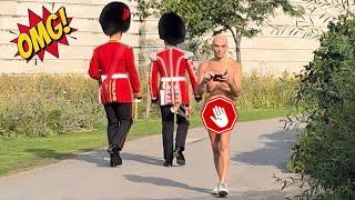 GUARDS CASUALLY WALK THROUGH THE PARK