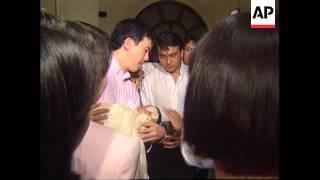 PHILIPPINES: CORAZON AQUINO SNUBS GRANDSON'S BAPTISM