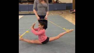 Little Girl Spins while Doing Splits