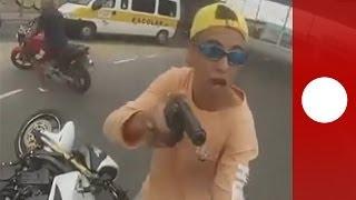 Graphic footage: Brazil cop guns down motorbike hijacker in Sao Paolo (caught on helmet cam)