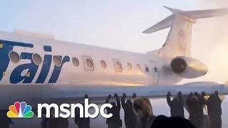 Russian Passengers Push Plane In Siberia | msnbc