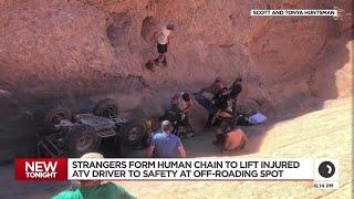 Strangers form human chain to lift injured ATV driver to safety