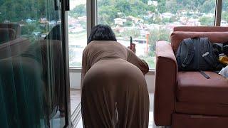 Cleaning the balcony. I'm wearing a transparent dress.