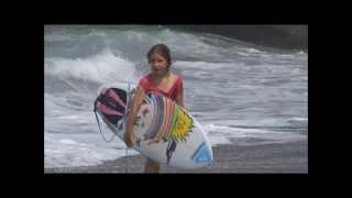 7YO girl surfing Bali Reefs