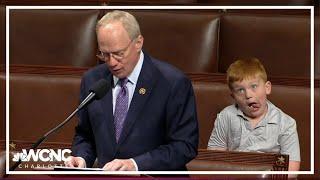 Congressman's 6-year-old son makes silly faces during House speech