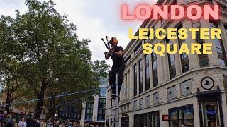 Leicester Square Central London with an amazing Street Perfomer from Japan