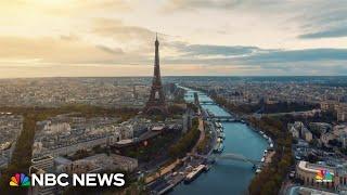 Paris mayor takes a swim in River Seine ahead of Olympics