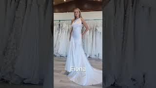 Wedding dresses with asymmetrical necklines at Alta Moda Bridal