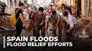 Spain floods: Volunteers continue helping with recovery efforts