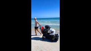 Walking on the beach with 2 kids in Veer Cruiser & Cybex Car Seat