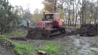 Old Soviet bulldozer DT 75 at work