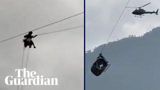 Children rescued from chairlift after cable snapped in Pakistan