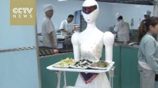 Cute robot waiter takes over restaurant in China