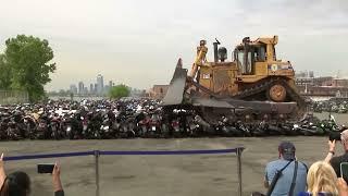 Bulldozer crushes illegal dirt bikes in New York City