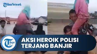 Viral Video Aksi Heroik Polisi Terjang Banjir di Lombok demi Selamatkan Warga, Ini Sosoknya