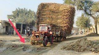 Talented Tractor Drivers with heavy load on the road under constructions