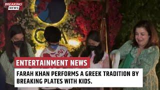 Farah Khan performs a Greek tradition by breaking plates with kids.