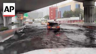 Heavy rains trigger flooding in Dubai, cars trapped as drainage systems overwhelmed