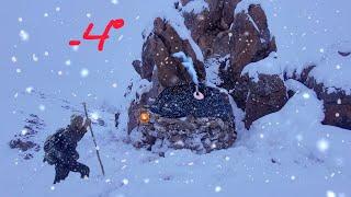 Survival shelter in snowy camping:Safe shelter under a rock in a snowstorm/bushcraft.