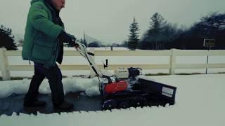 Pushing Snow with a Mini Snow Plow