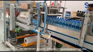 McDowell's No1 Mineral Water Bottle 1Ltr Fully Automatic High Speed Rotary Shrink Wrapping Machine
