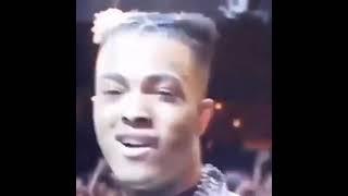 XXXTENTACION slowly smiling at camera meme template