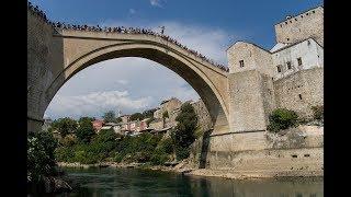 Extremely dangerous jump from Stari Most bridge, Mostar.