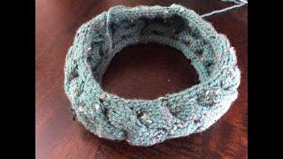 Knitted cable headband.