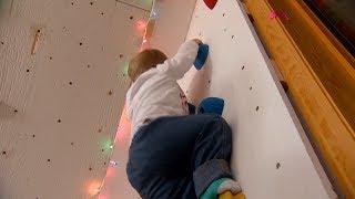 This toddler is a rock climbing champ