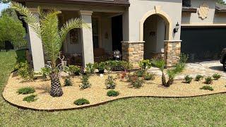 Installing Brown river rock & @Colmet  landscape edging in NORTH FLORIDA