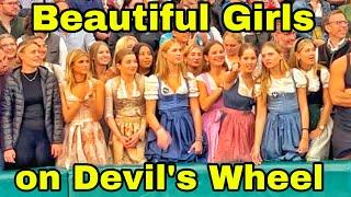 Beautiful Girls on the Devils Wheel at the oktoberfest in Munich 2023//Teufelsrad