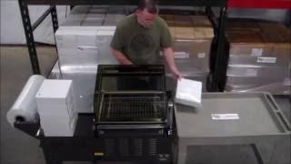 Shrink Wrapping Boxes with a Shrink Chamber