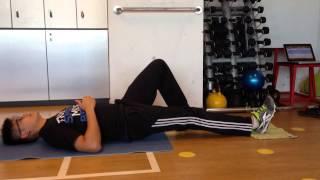 Single leg towel heel slide in Hamstring activation with eccentric slide out