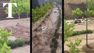 Cars washed away during heavy floods in Spain