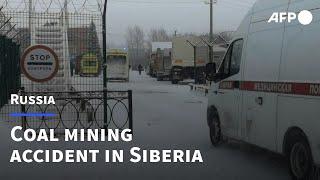 Emergency services on site of fatal Siberian coal mine accident | AFP