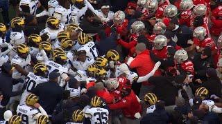 Ohio State vs. Michigan fight: Players brawl after Michigan players try to plant flag at midfield