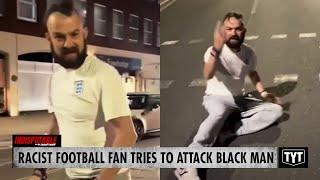 WATCH: Bigoted Football Fan Swings At Black Man, Fails Miserably