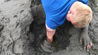 Digging Geoduck in the Puget Sound.