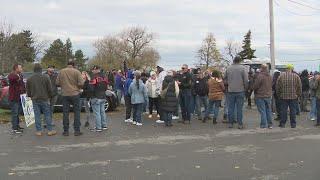 Sumitomo Rubber employees gather for rally after company announces plant closure