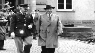 US Senator Harry F Byrd and General Miles Reber enter Panzer Kaserne Headquarters...HD Stock Footage