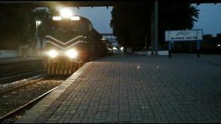 Railcar passing by junction in Pakistan