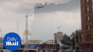 'Floating city' appears in the sky after a heavy hailstorm - Daily Mail